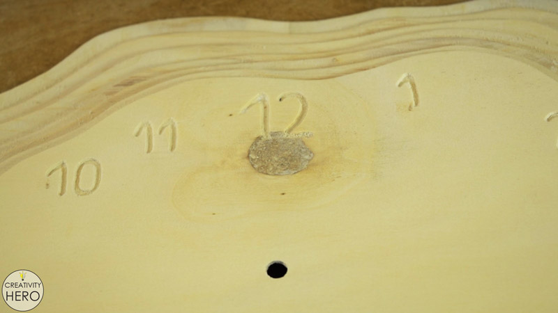 Making a Layered Plywood Wall Clock with a Tree Ring Shape 28 - A knot appeared when sanding